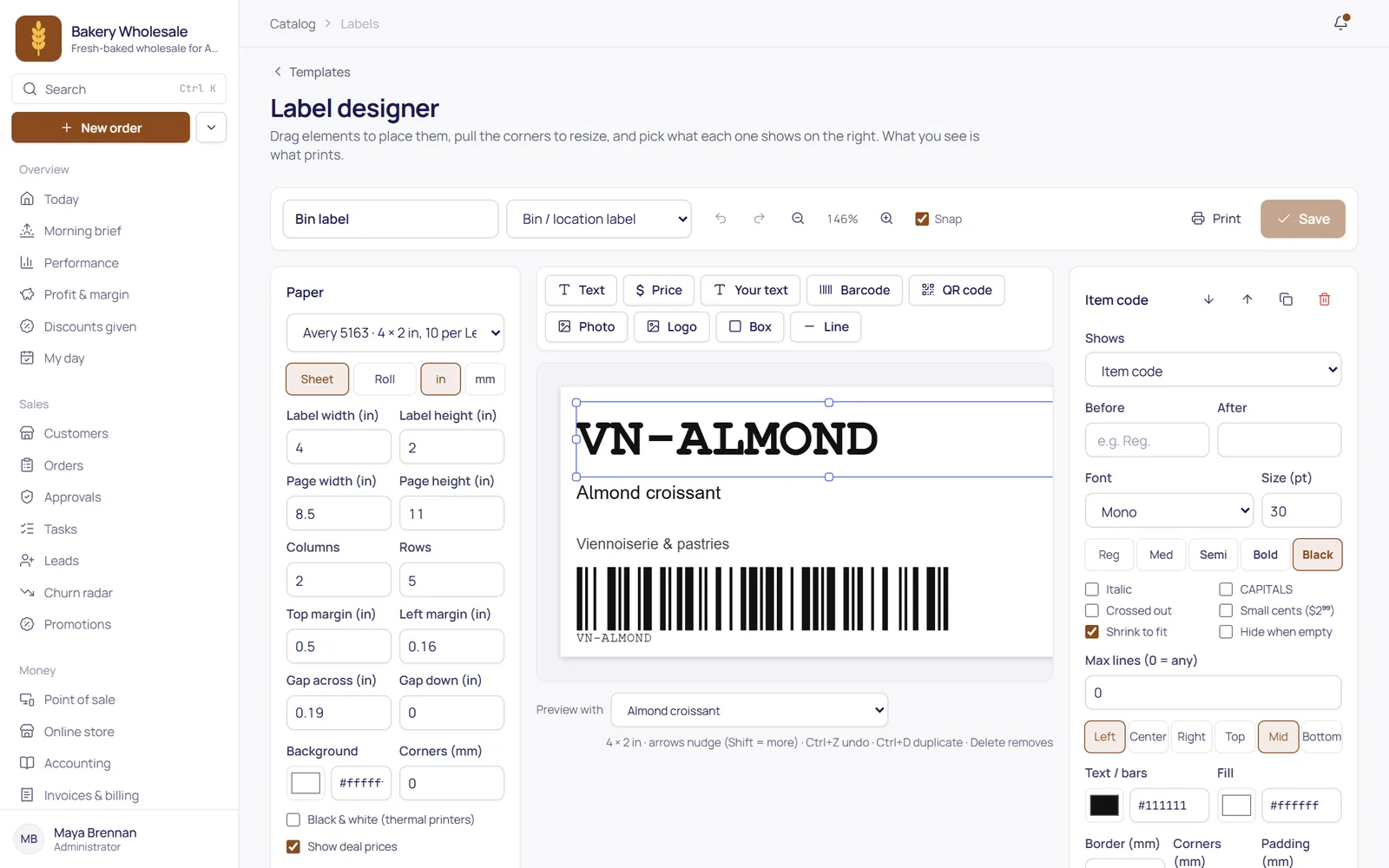 The label designer: a bin label with the item code, name and barcode, and its settings